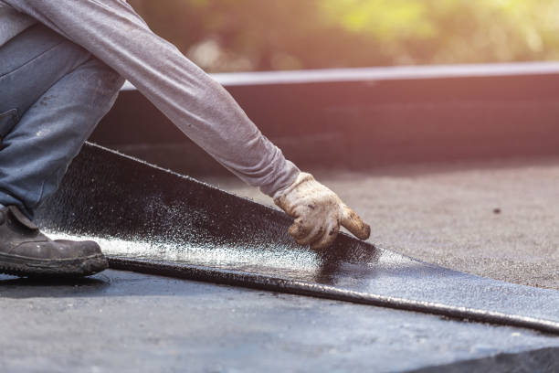 Professional Basement Waterproofing technician working in Bourneville, OH